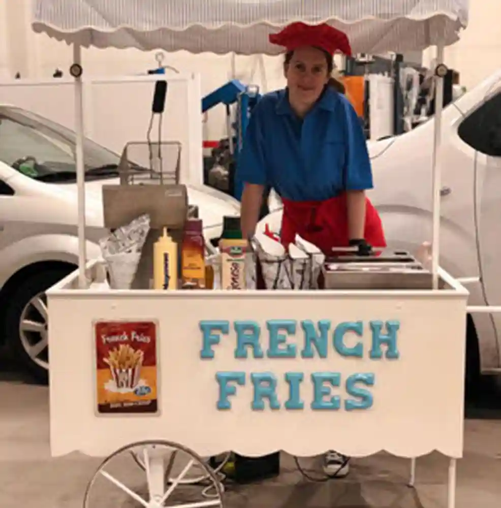 Guests collecting freshly made fries at a corporate event