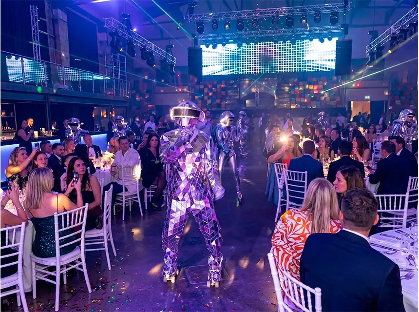 Illuminated skaters opening the dance floor at a wedding