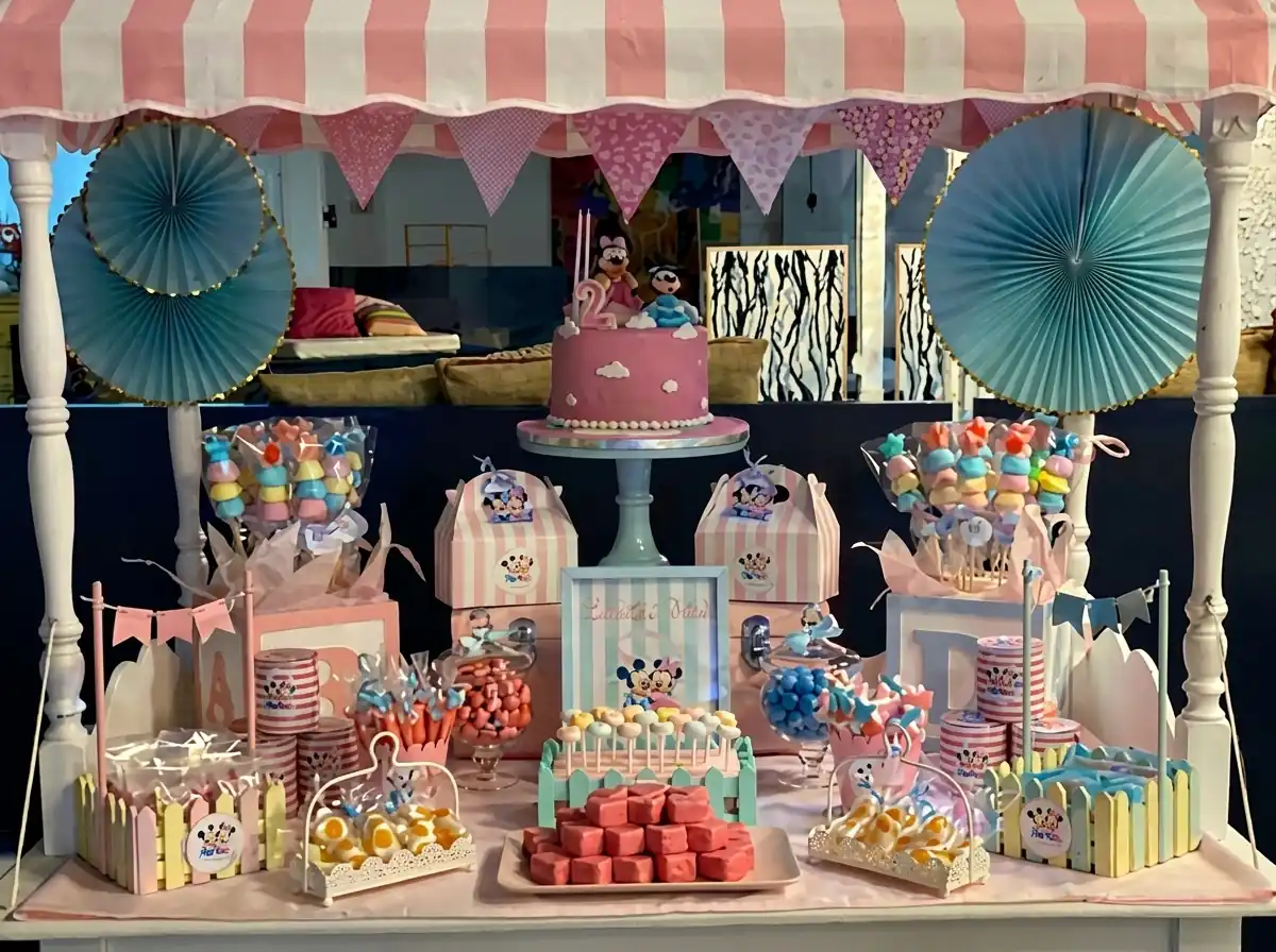 Children helping themselves at a birthday sweet cart