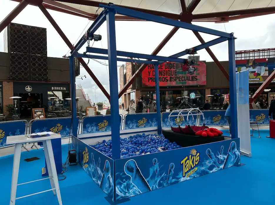 Human claw machine at a local town festival