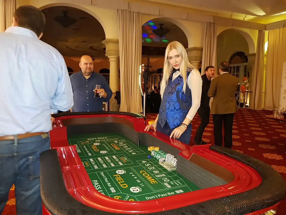 Guests rolling dice at a charity gala