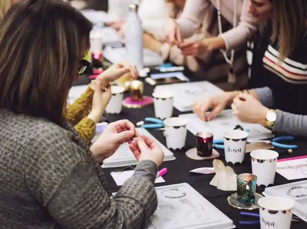 Children making colourful bracelets at a kids' party