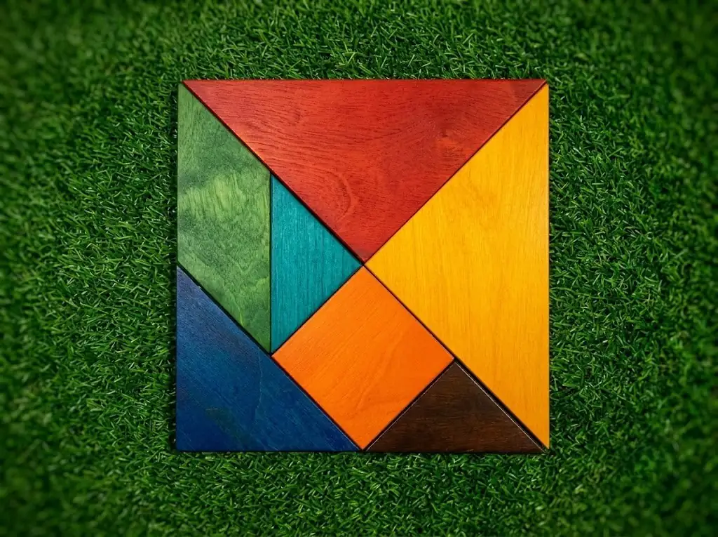 Giant wooden tangram at an outdoor wedding