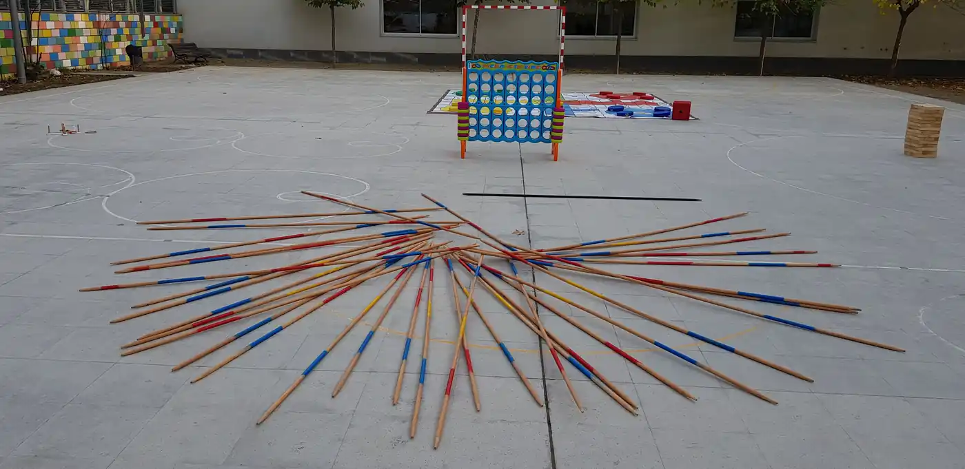 Giant mikado game at an outdoor festival