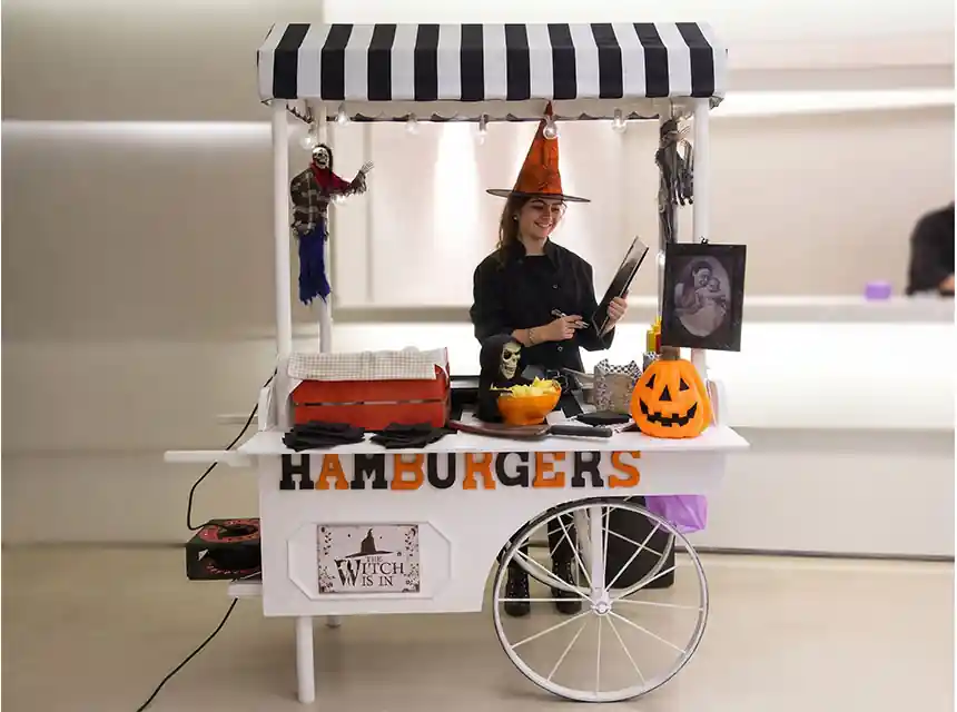 Wedding guests collecting burgers from the cart
