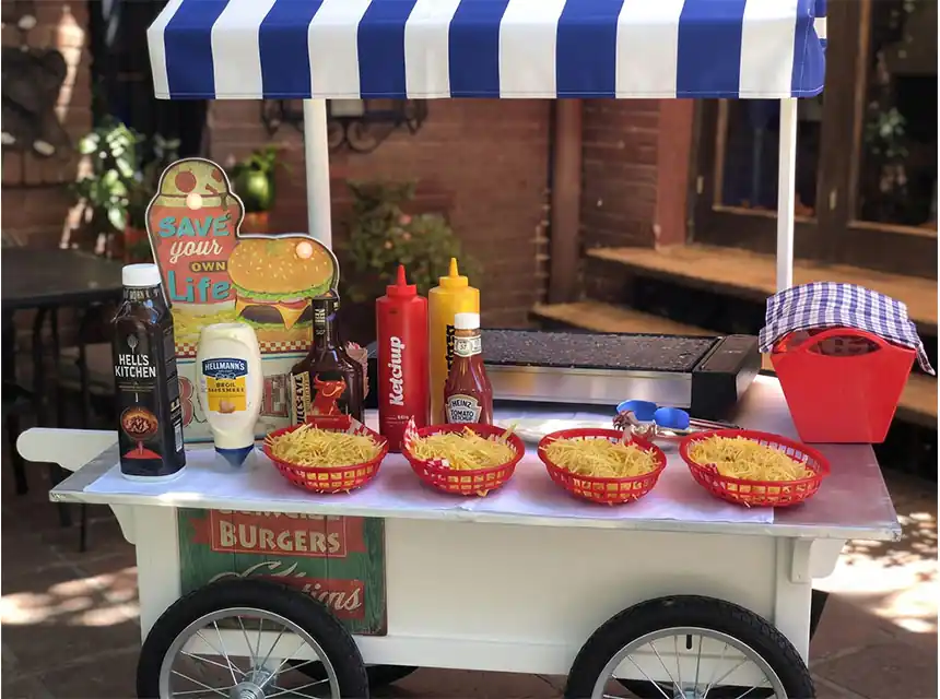 Burger cart branded with a company logo at a trade fair