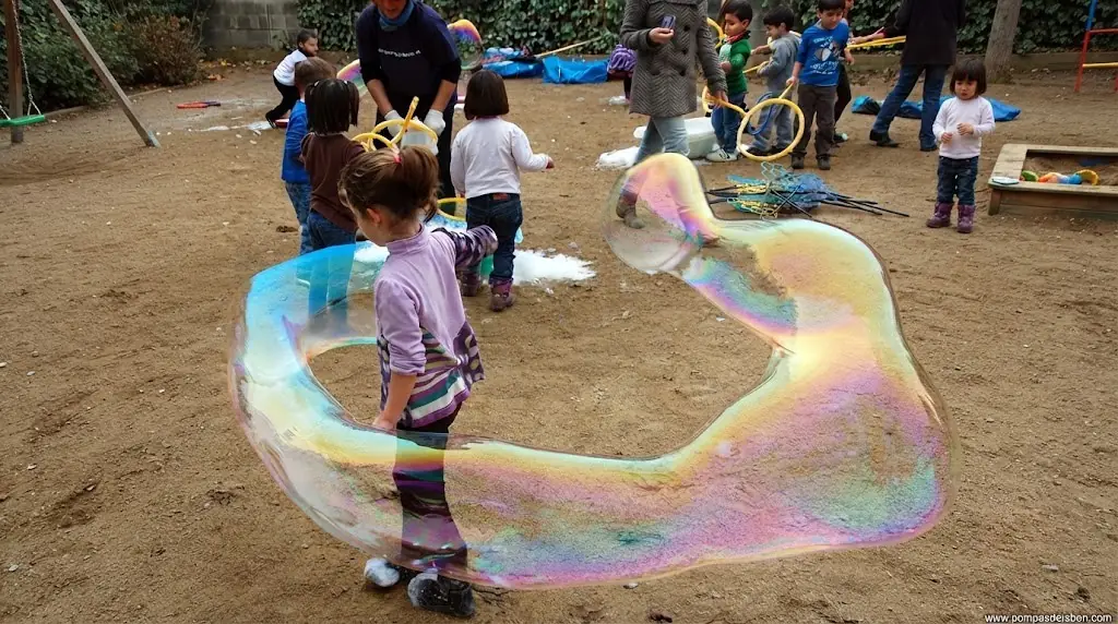 Girl inside a giant bubble at a communion