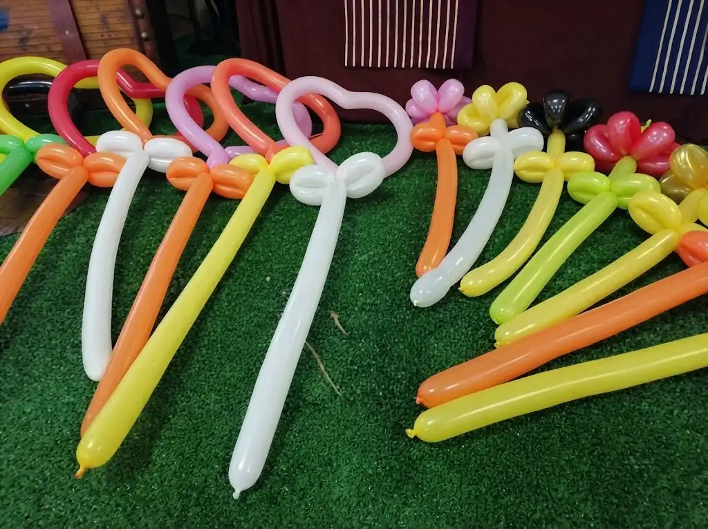 Balloon modelling workshop at a company family day