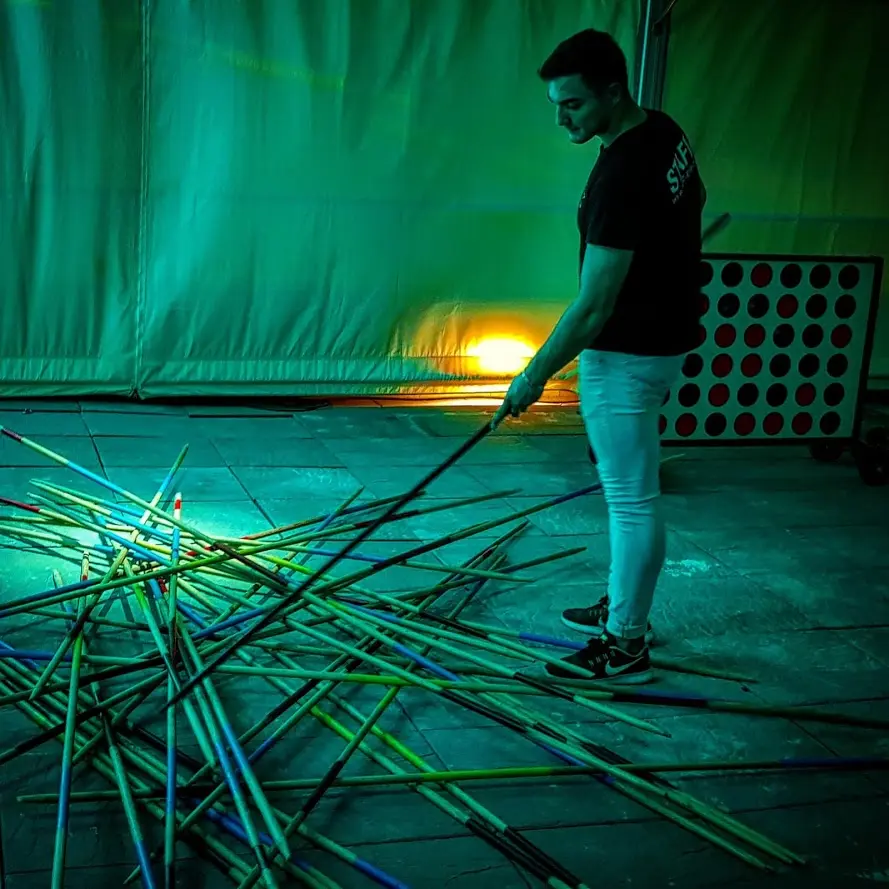 Delegates playing giant mikado during a conference break