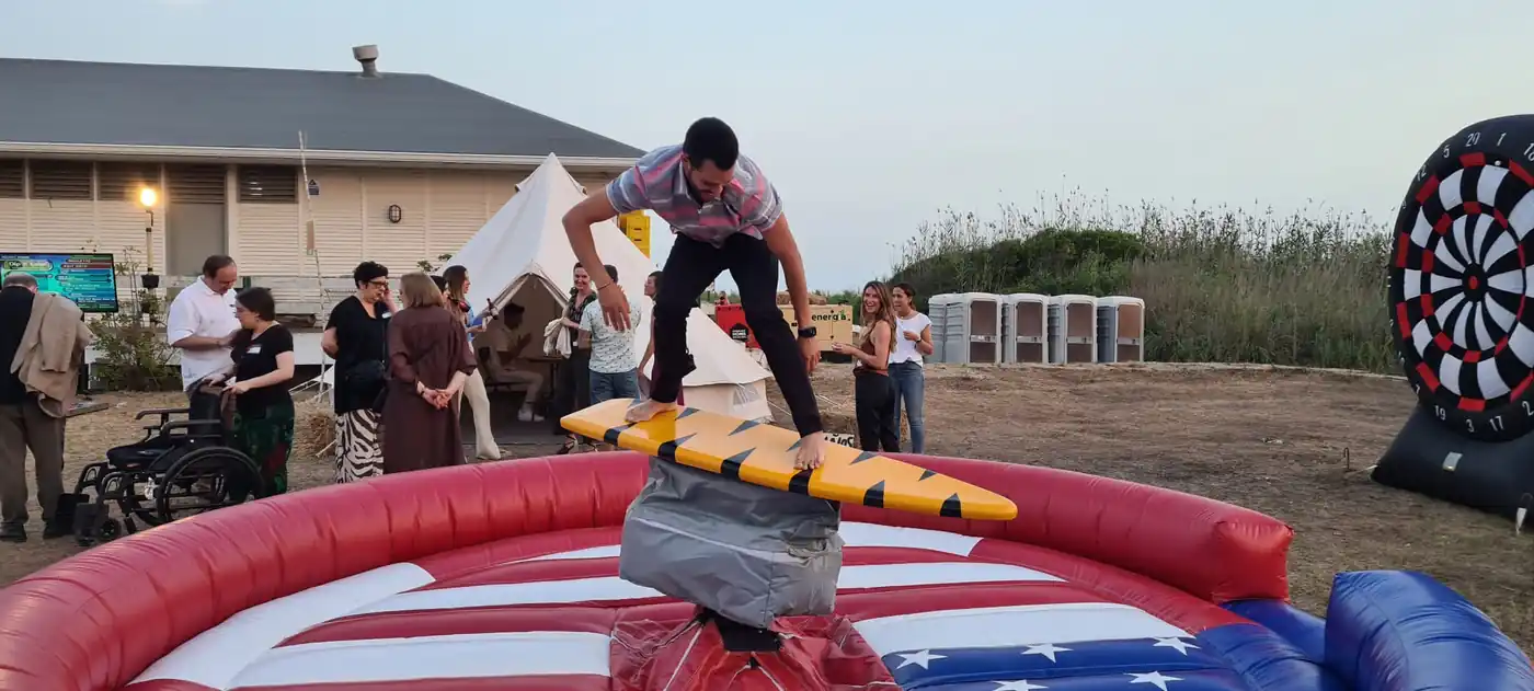 Mechanical surfboard at a summer town festival