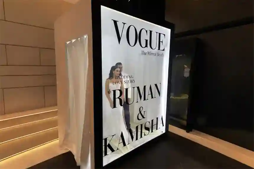 Guests posing at the Vogue photocall during a Christmas dinner