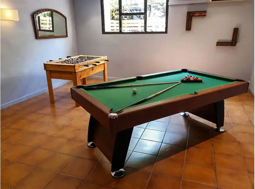 Lounge area with a professional pool table at a corporate event