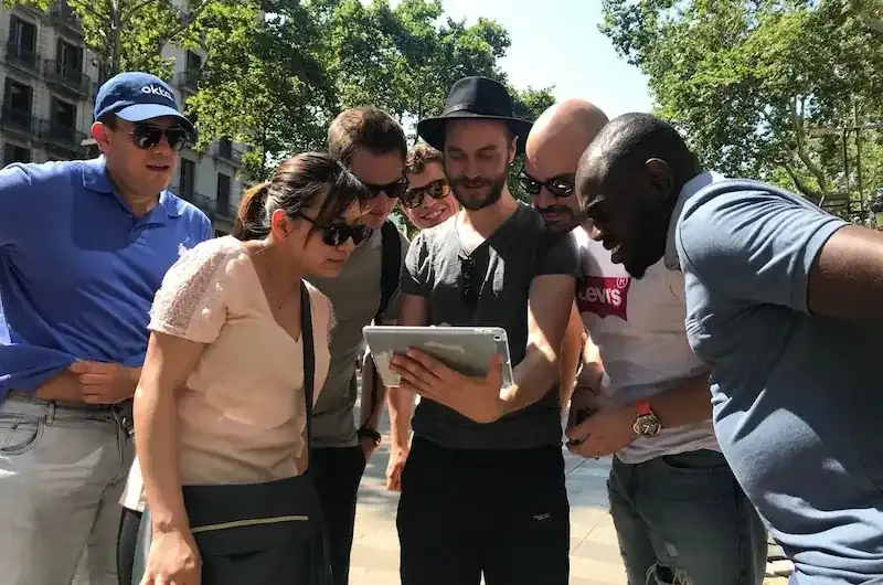 Colleagues completing a photo mission at a conference