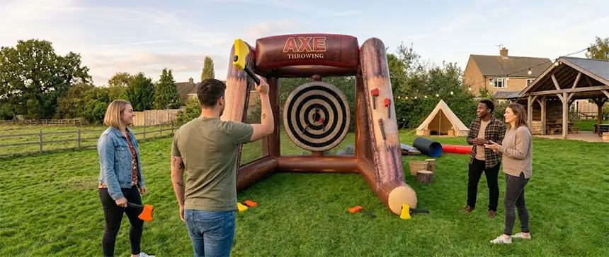 Inflatable axe throwing target on a trade show stand