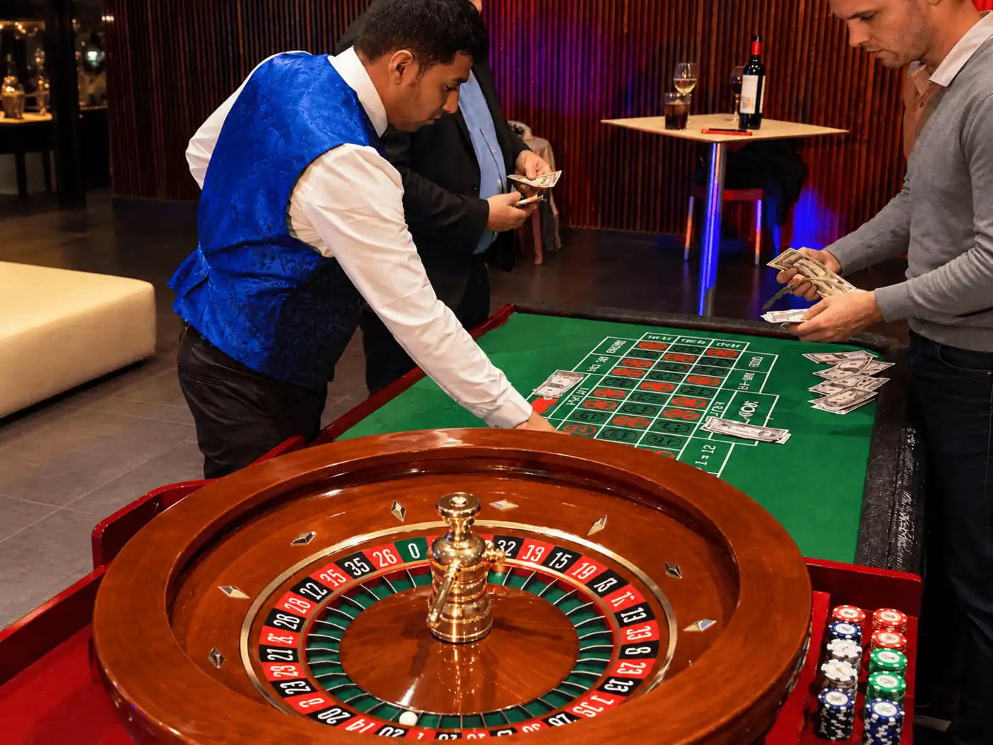 French roulette table at a wedding with guests placing bets