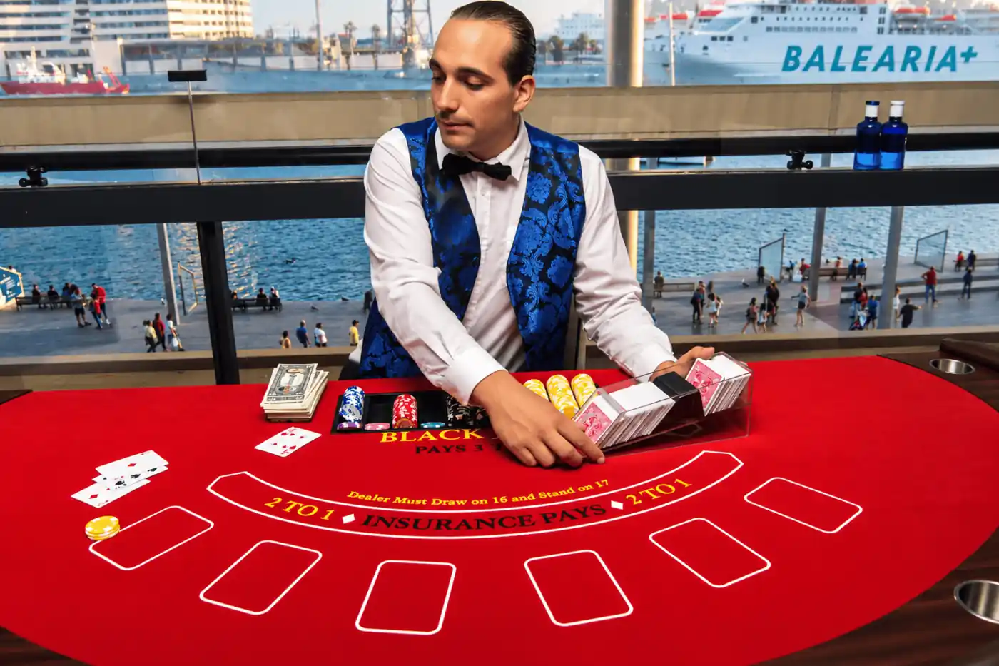 Guests playing twenty-one at a casino-themed wedding