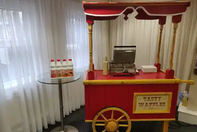 Freshly made waffles with cream at a corporate event