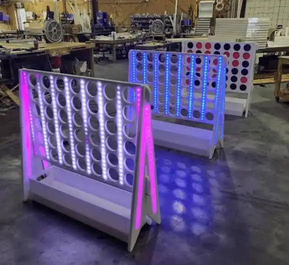 Conecta 4 gigante LED en el cóctel de una boda